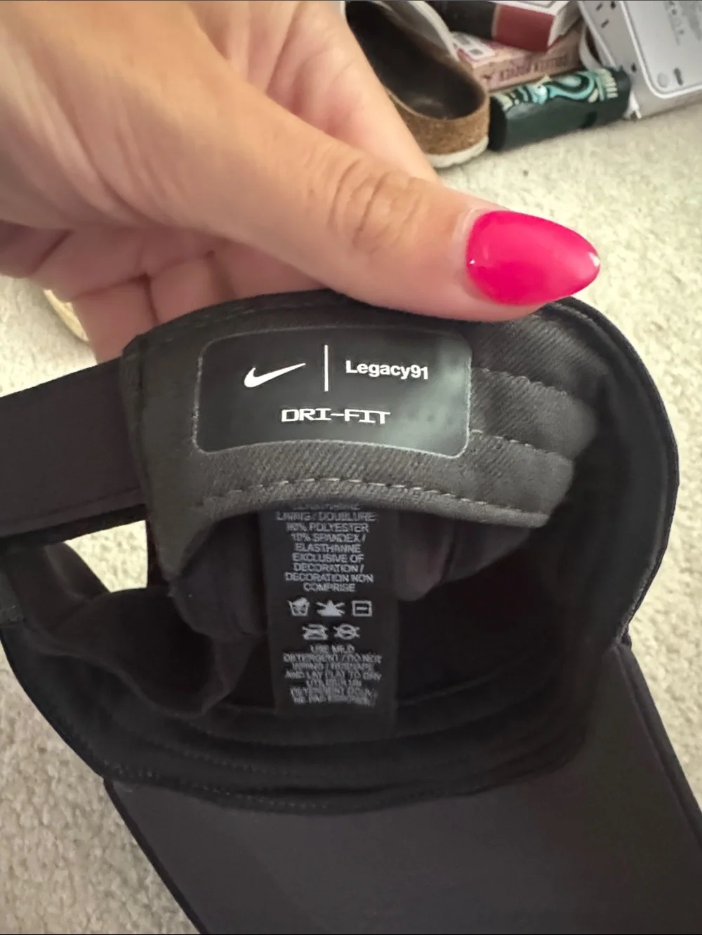 Nike Black Cap with White Swoosh Logo
